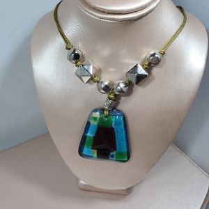 Nwot leather necklace w picasso pendant